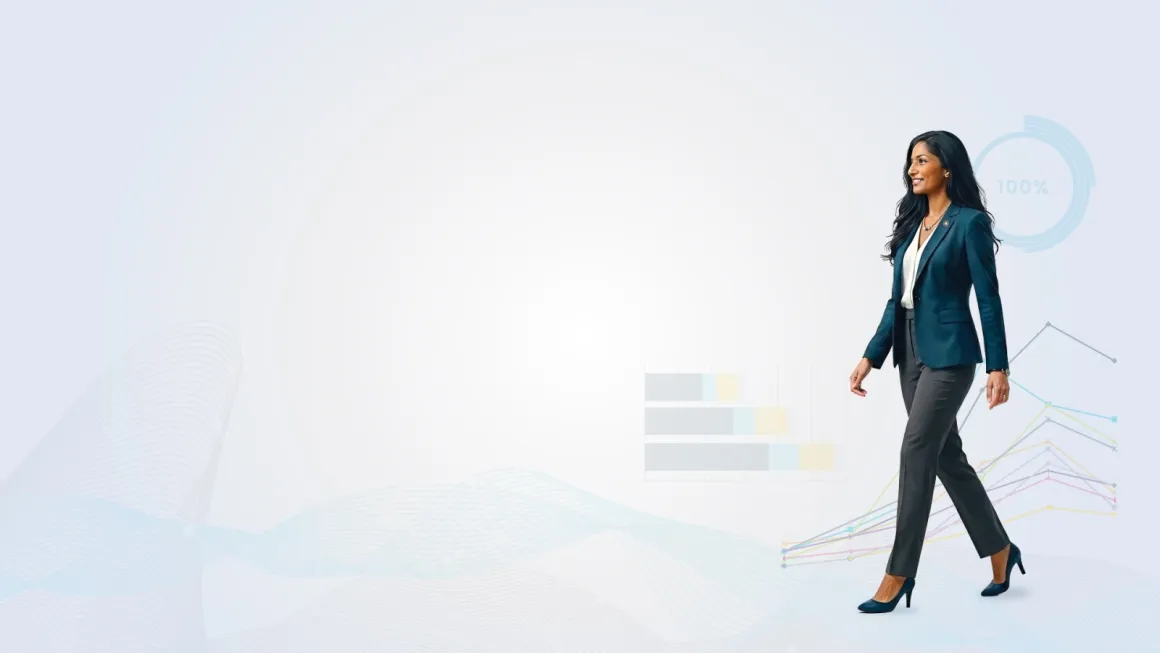 Business professional walking through a bright office